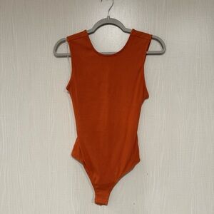 Triple 7 Orange Bodysuit Minimalist Design